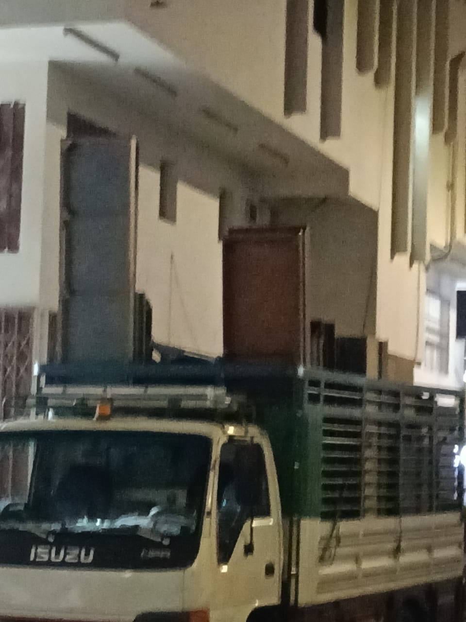 Moving truck outside a residential building